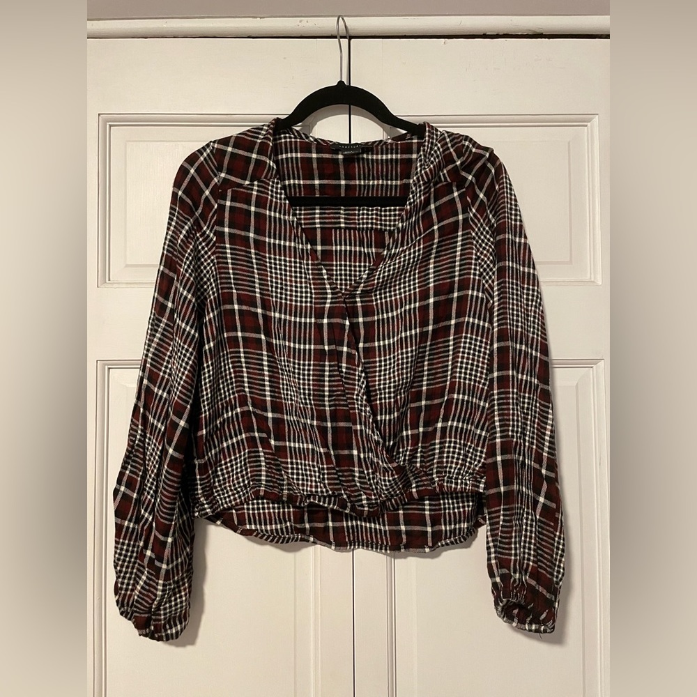 Long sleeve faux wrap shirt